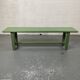 Green wooden bench