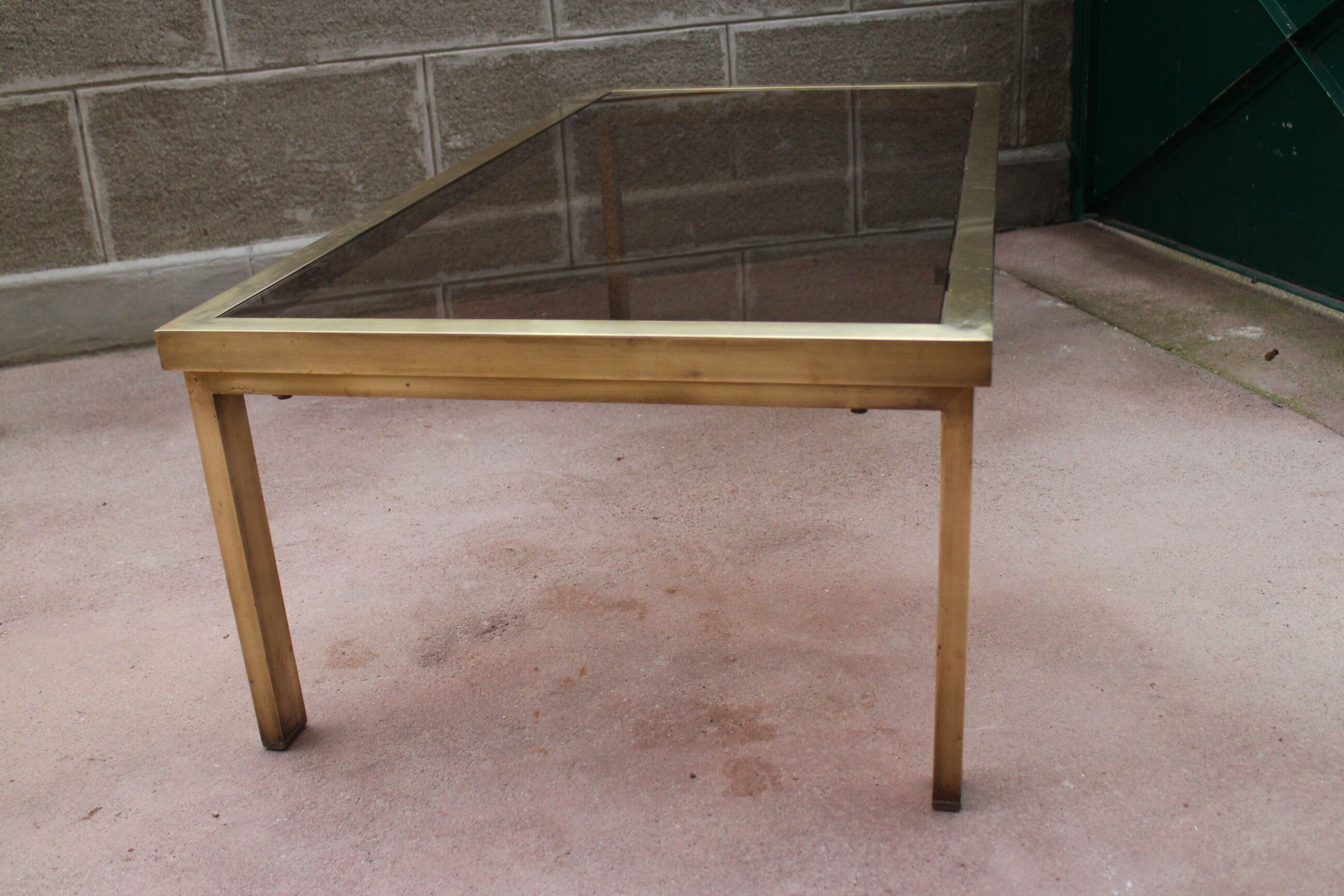 Brass coffee table and 1970 smoked glass