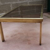 Brass coffee table and 1970 smoked glass