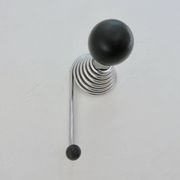 "Streamline" wall coat rack in chromed metal and black lacquered wood, 1970.