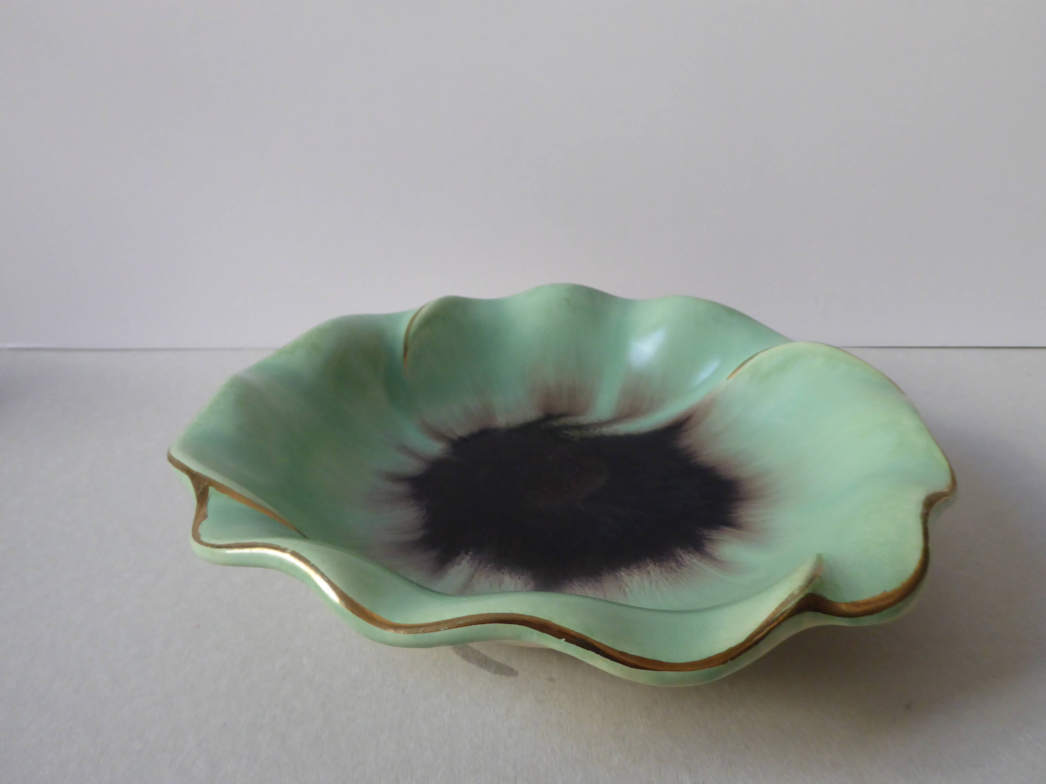 Flower-shaped sandstone dish