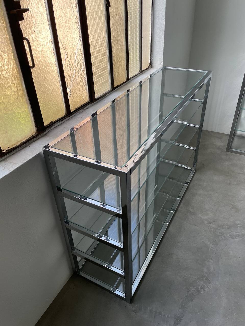Pair of chrome and glass shelves from the 70s