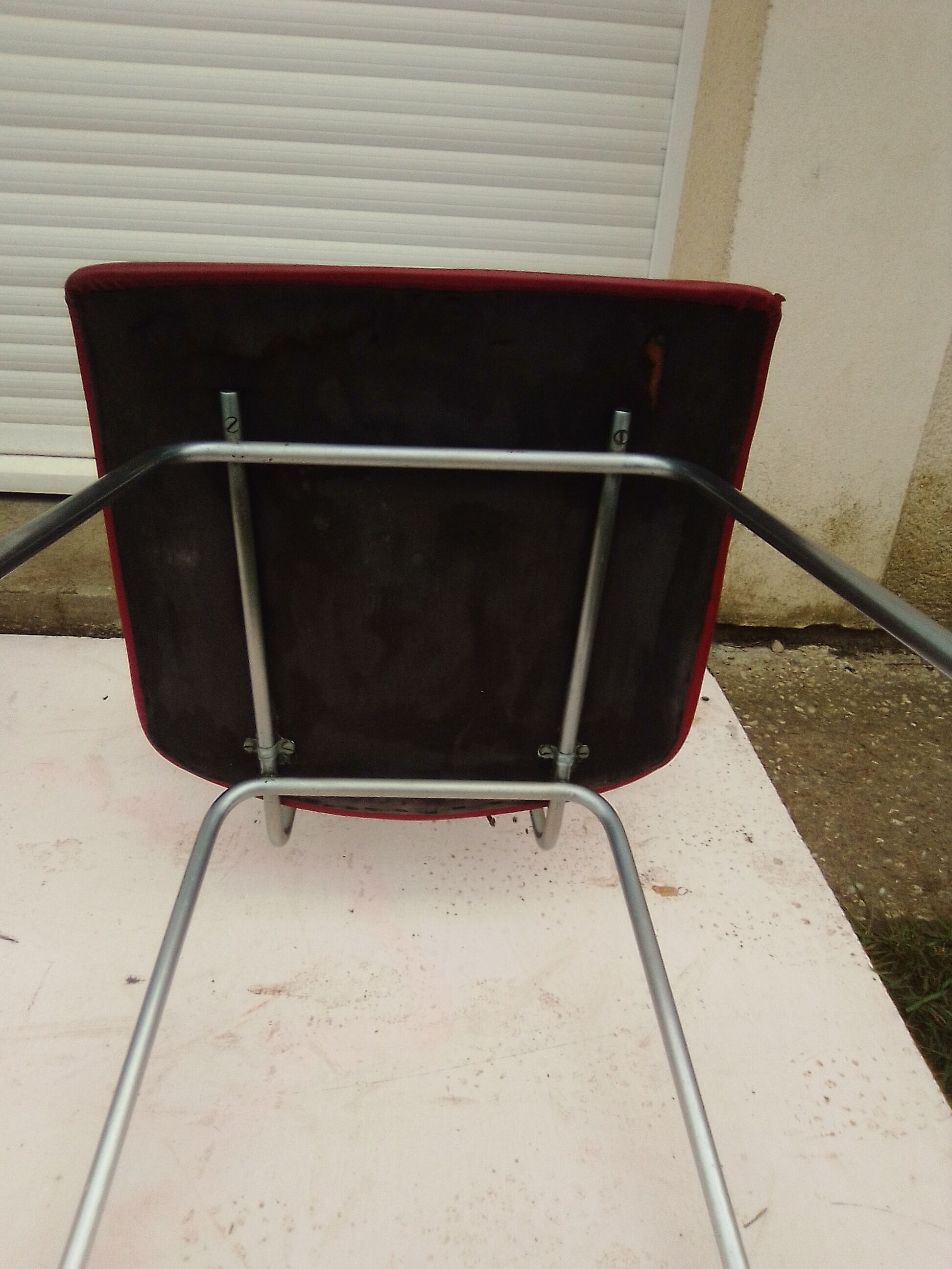 2 chairs in red skaï metal struxture 70s