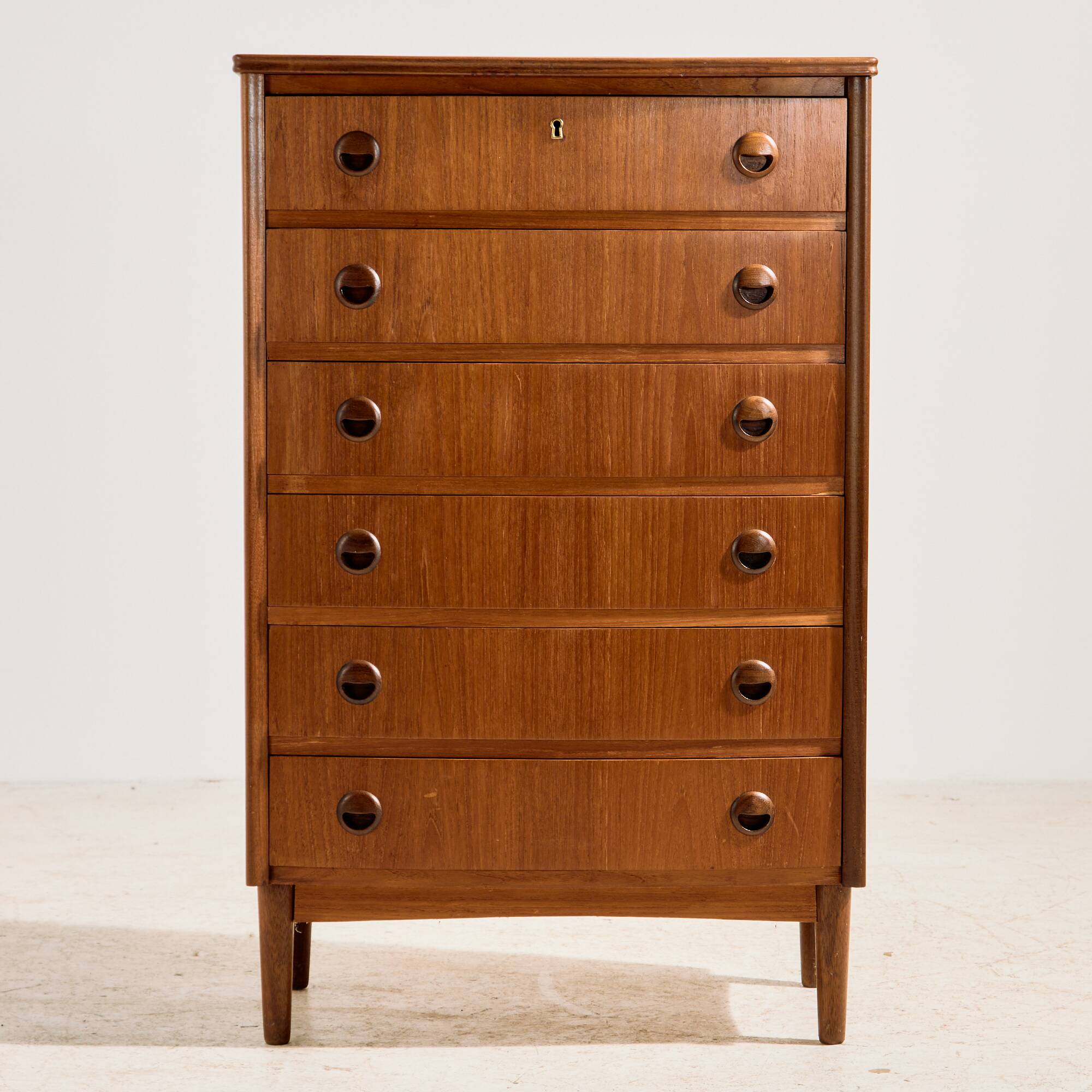 Teak chest of drawers with six drawers