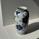 Vase white background stylized blue, yellow and green flowers H24.5 D12