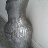 Old metal pitcher vase