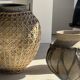 Immense light grey antique-style pot with a crosshatch lid and handles.