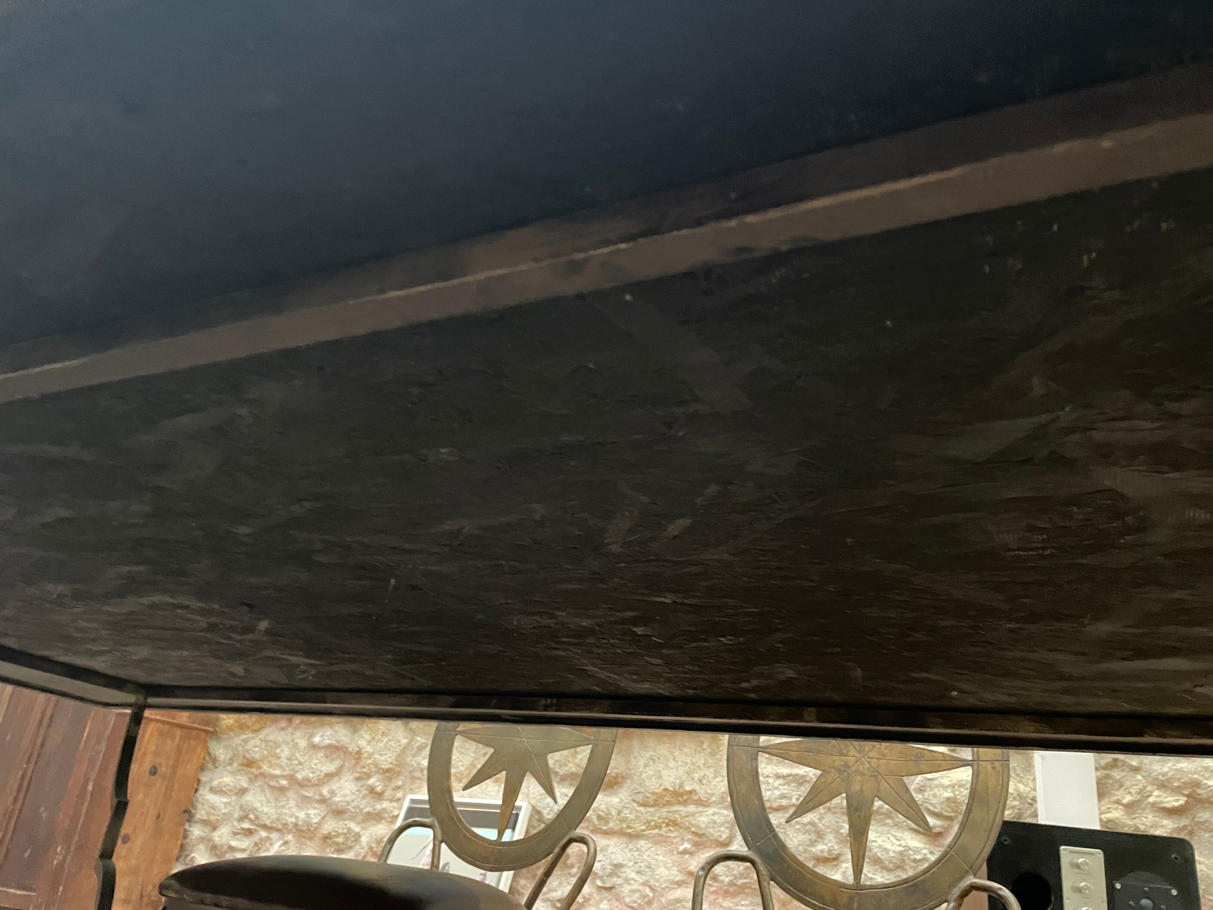 Wrought iron table on marble