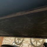 Wrought iron table on marble