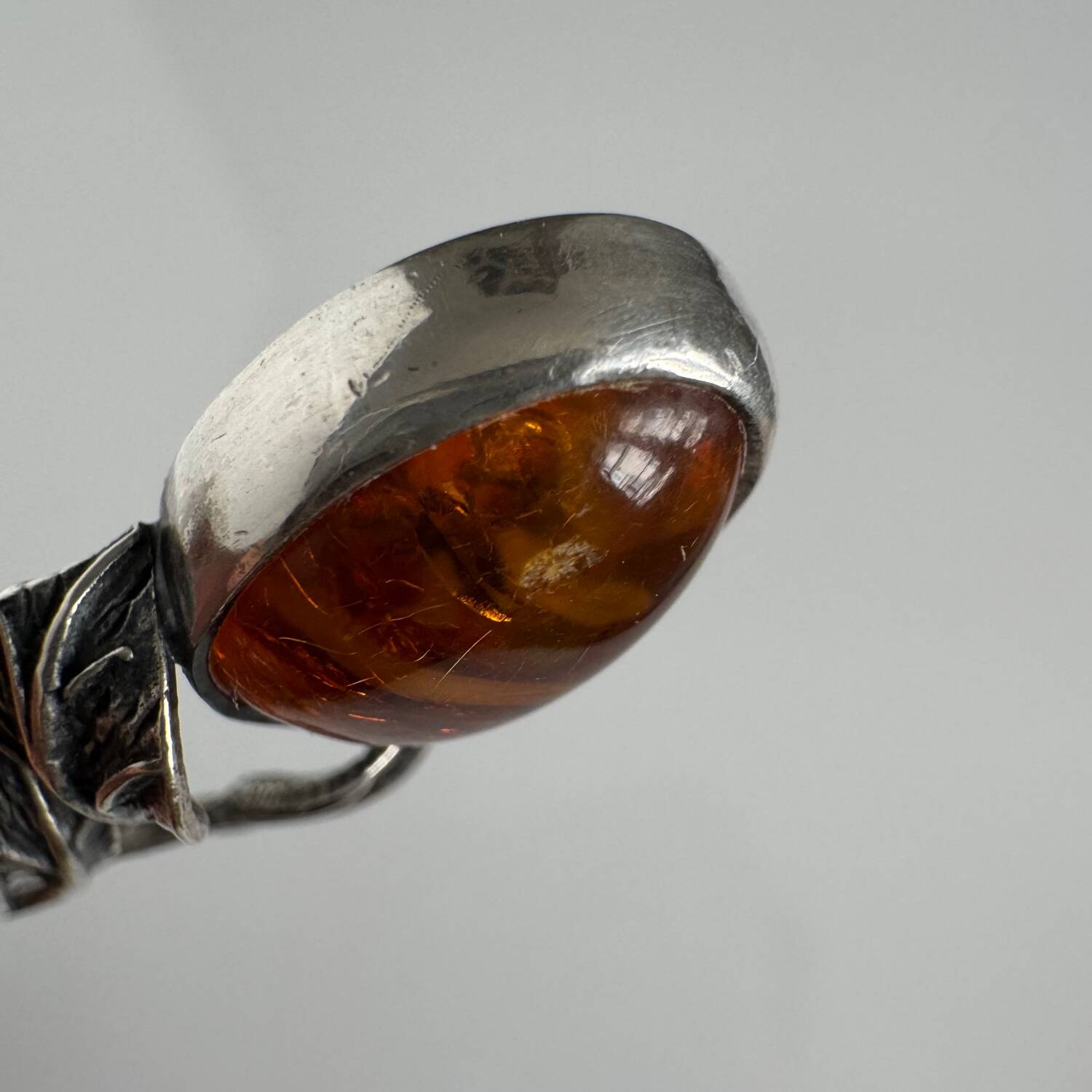 Silver spoon with amber