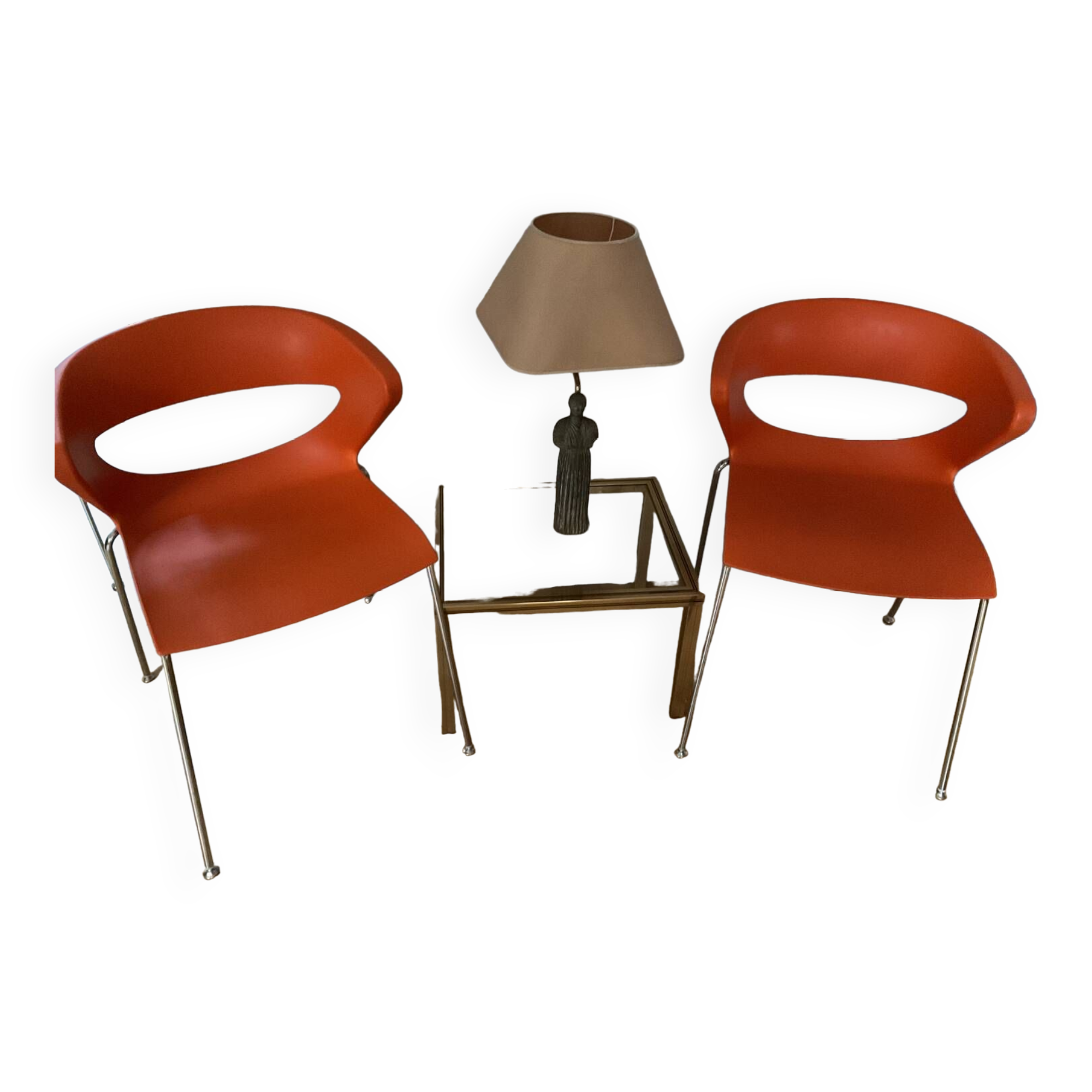 Two orange kicca chairs made in italy tbe
