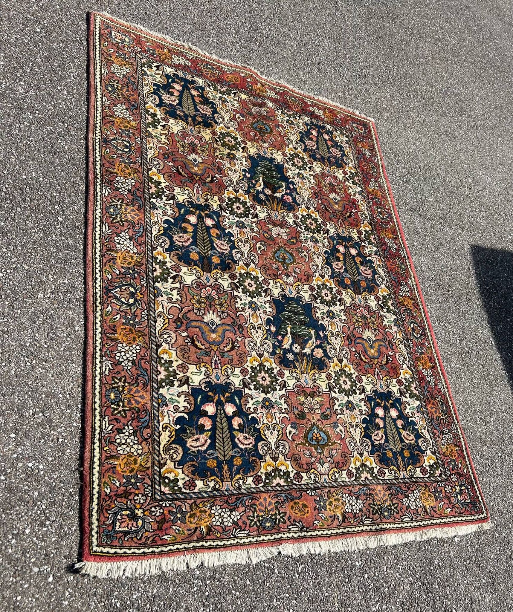 tapis d'orient à décor d'oiseaux 150/205cm