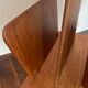 Magazine rack, in oak, by Pierre Cruège