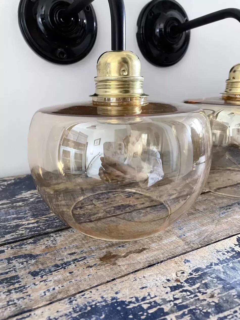 Pair of gold globe wall sconces