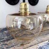 Pair of gold globe wall sconces
