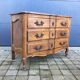 Commode arbalète