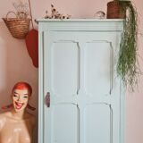 Parisian wardrobe small format soft green interior terracotta