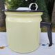Yellow enamelled milk kettle