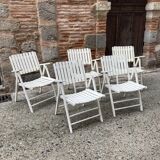 Five wooden garden armchairs