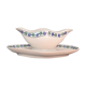 Saucière ancienne française blanche et bleue, en porcelaine opaque, à motif de fleurs bleues