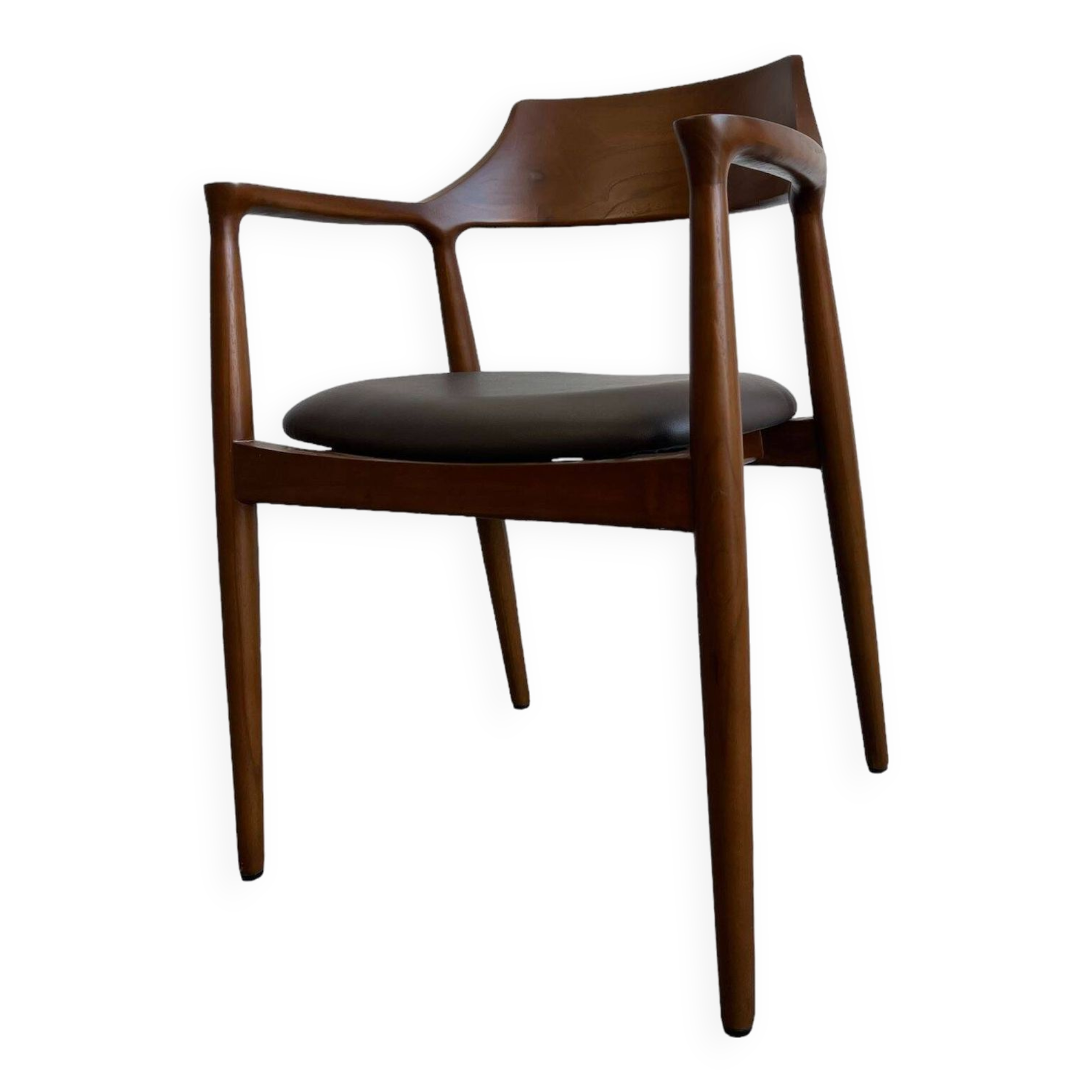Curved wooden dining chair with brown leather seat