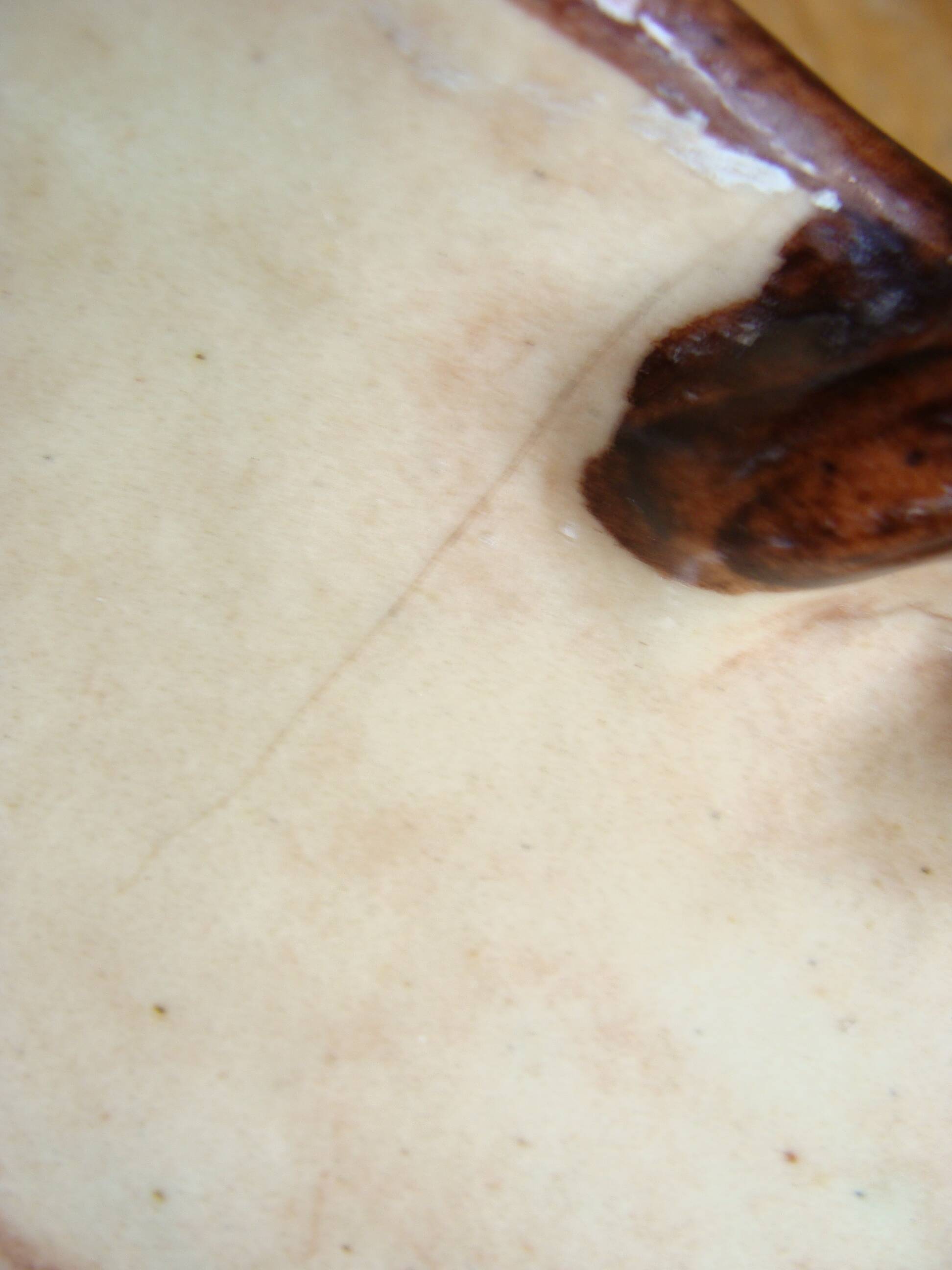 Antique engraved and enamelled ceramic cup