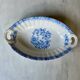 Antique oval dish with handles in earthenware