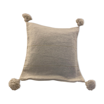 White cushion cover with pom poms