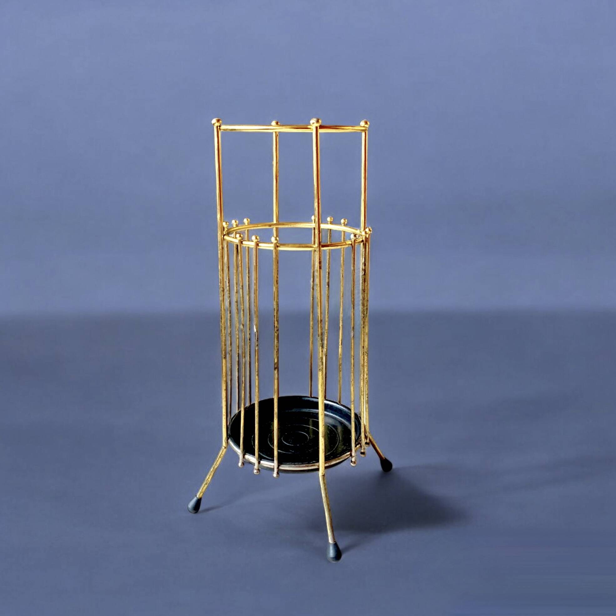 Vintage gold metal umbrella stand