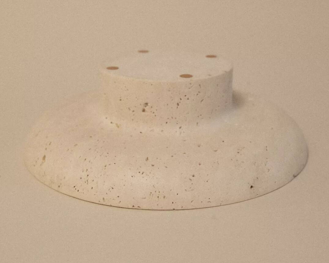 Travertine pocket emptier