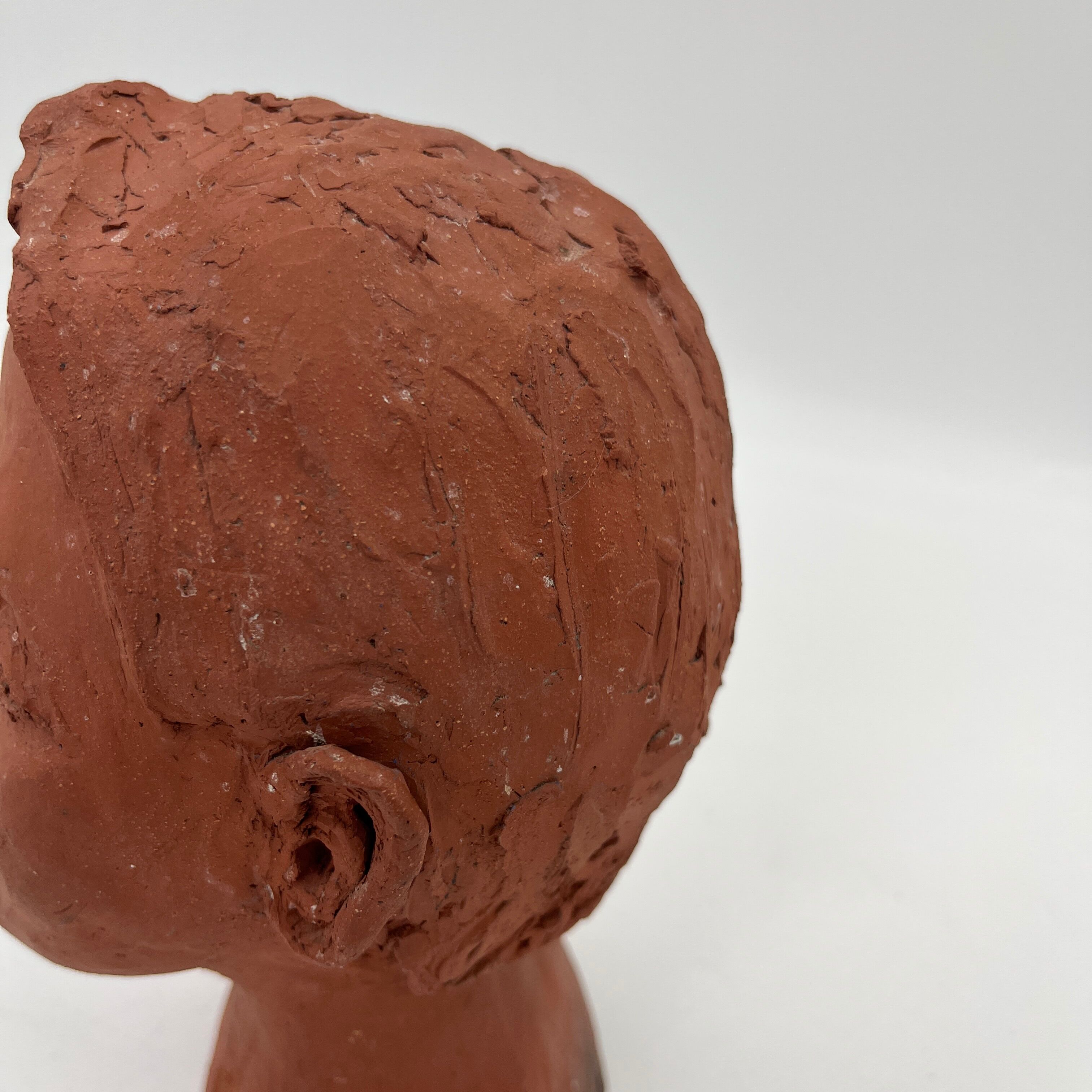 Terracotta child's head