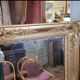 Antique gilded mirror from the 19th century, mercury mirror.