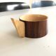 Vintage wooden cups and saucers in teak