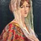 Portrait of a young woman in white scarf