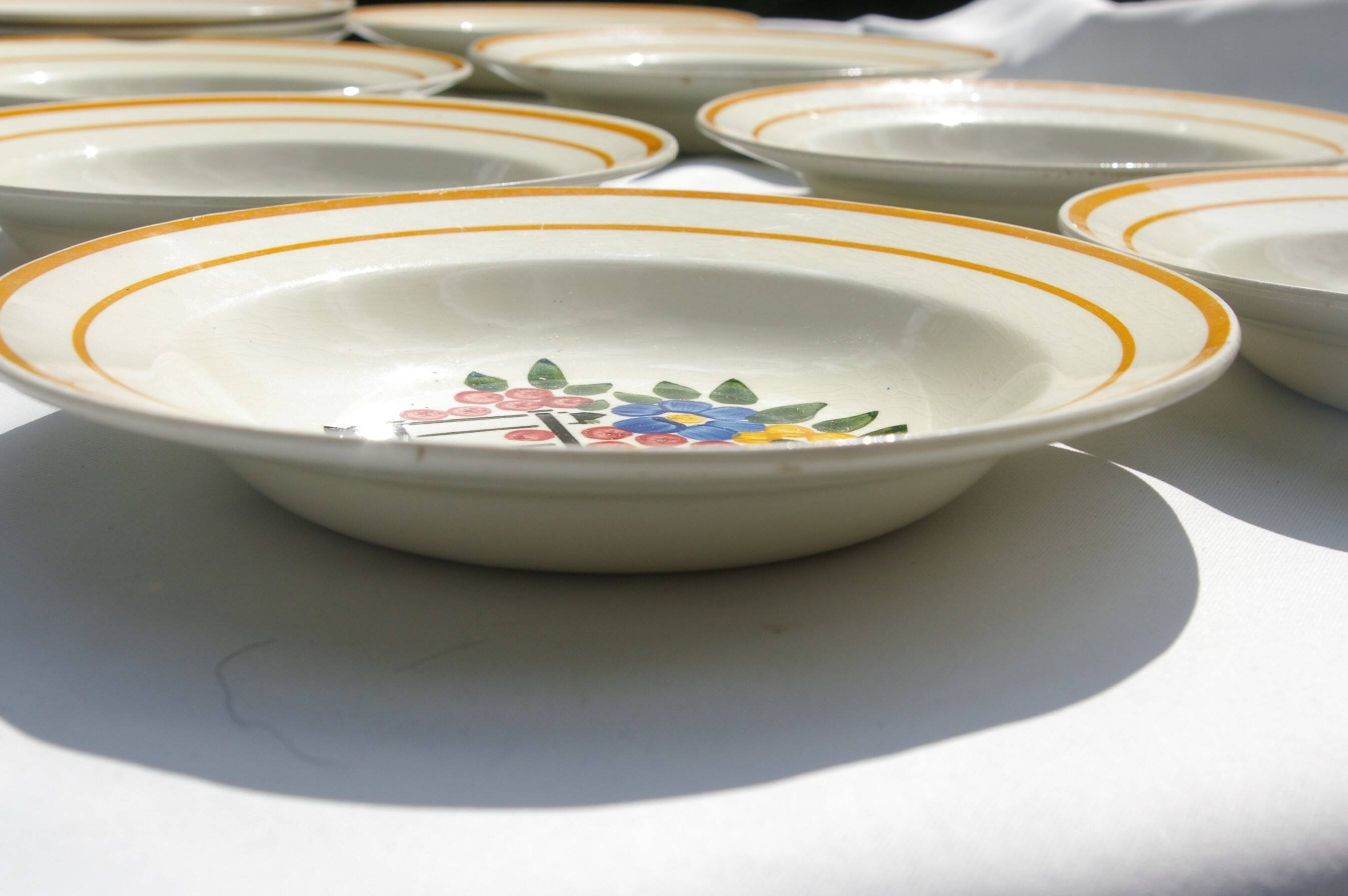 10 HB Creil Montereau earthenware soup plates, "Fleuri" model