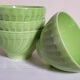 Four vintage spring green earthenware bowls