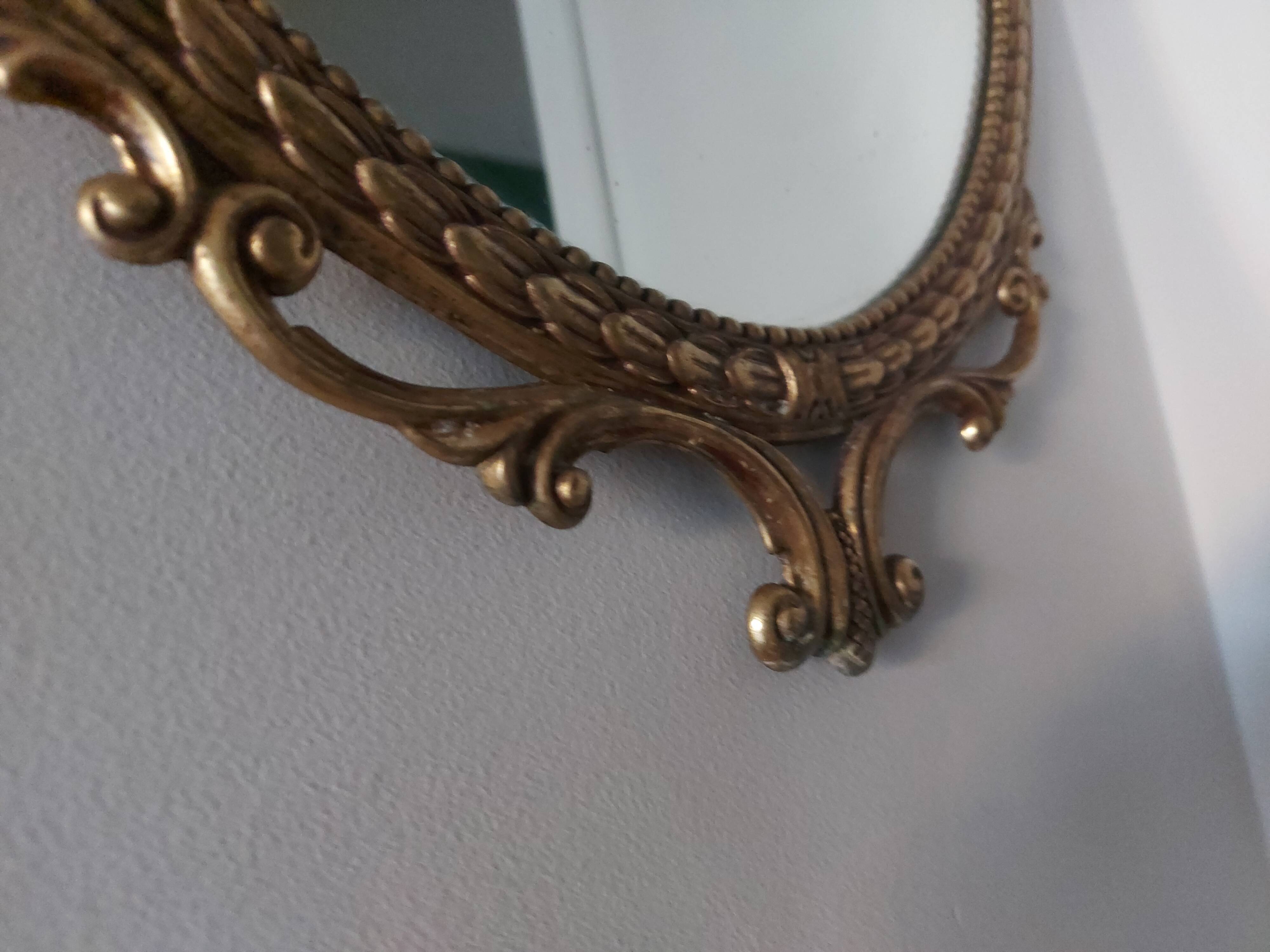 Baroque mirror in gilded brass, C.G.R