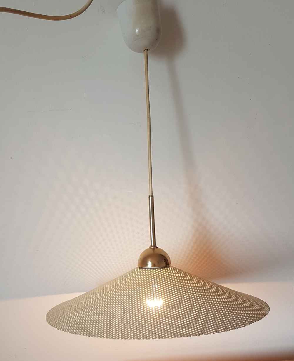 Perforated metal suspension from the 60s to 70s