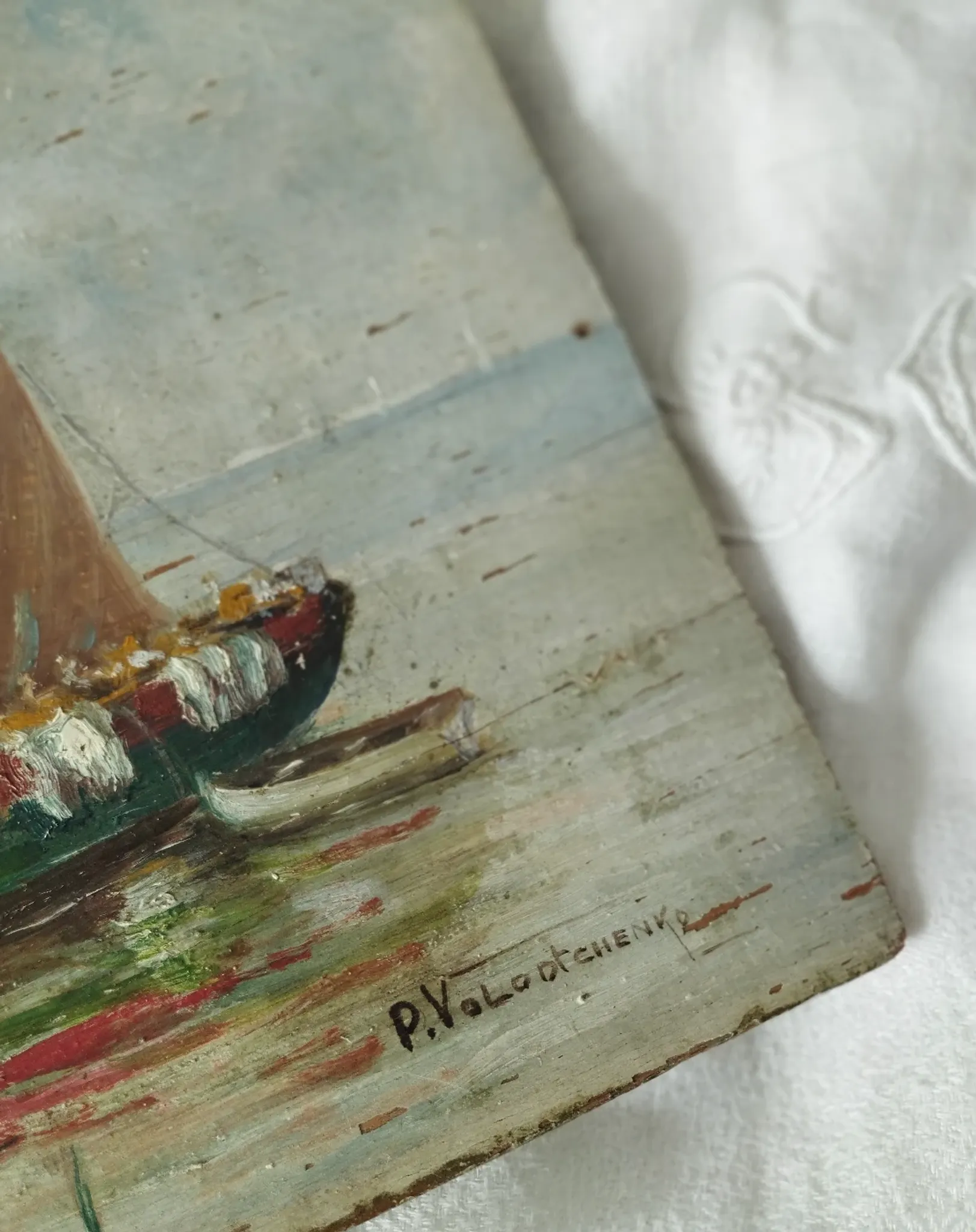 Fishing boats on calm sea. oil painting signed p. volotchenko.