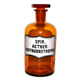 Old apothecary bottle Glass pharmacy bottle with enameled label