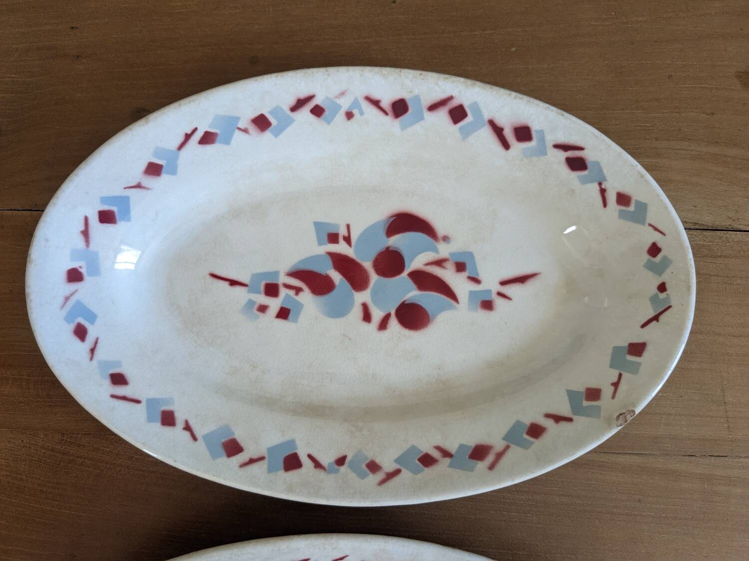 Pair of Moulin des loups dishes