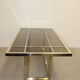 Dining table in chrome-plated steel and brass by Romeo Rega circa 1970