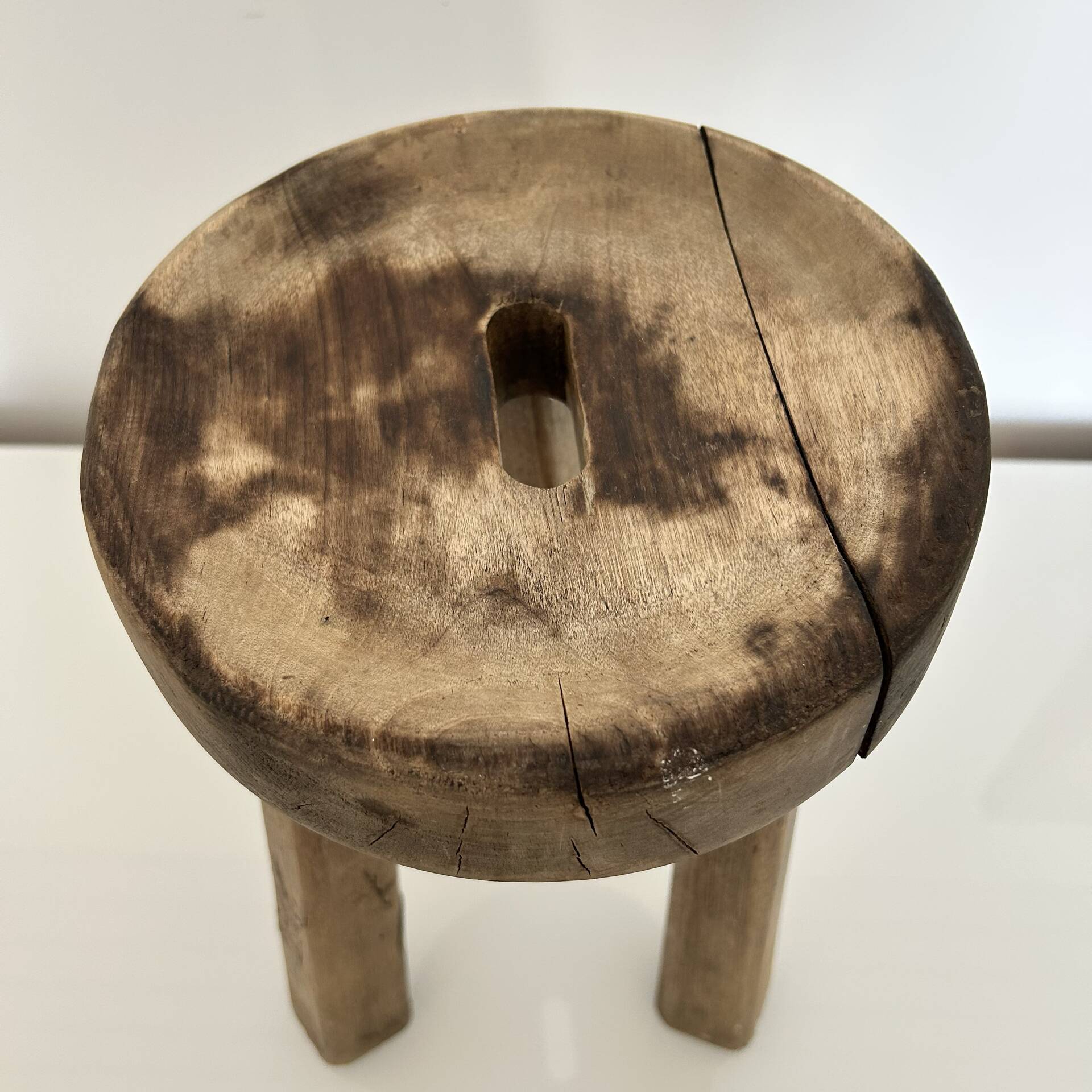 Patinated tripod stool