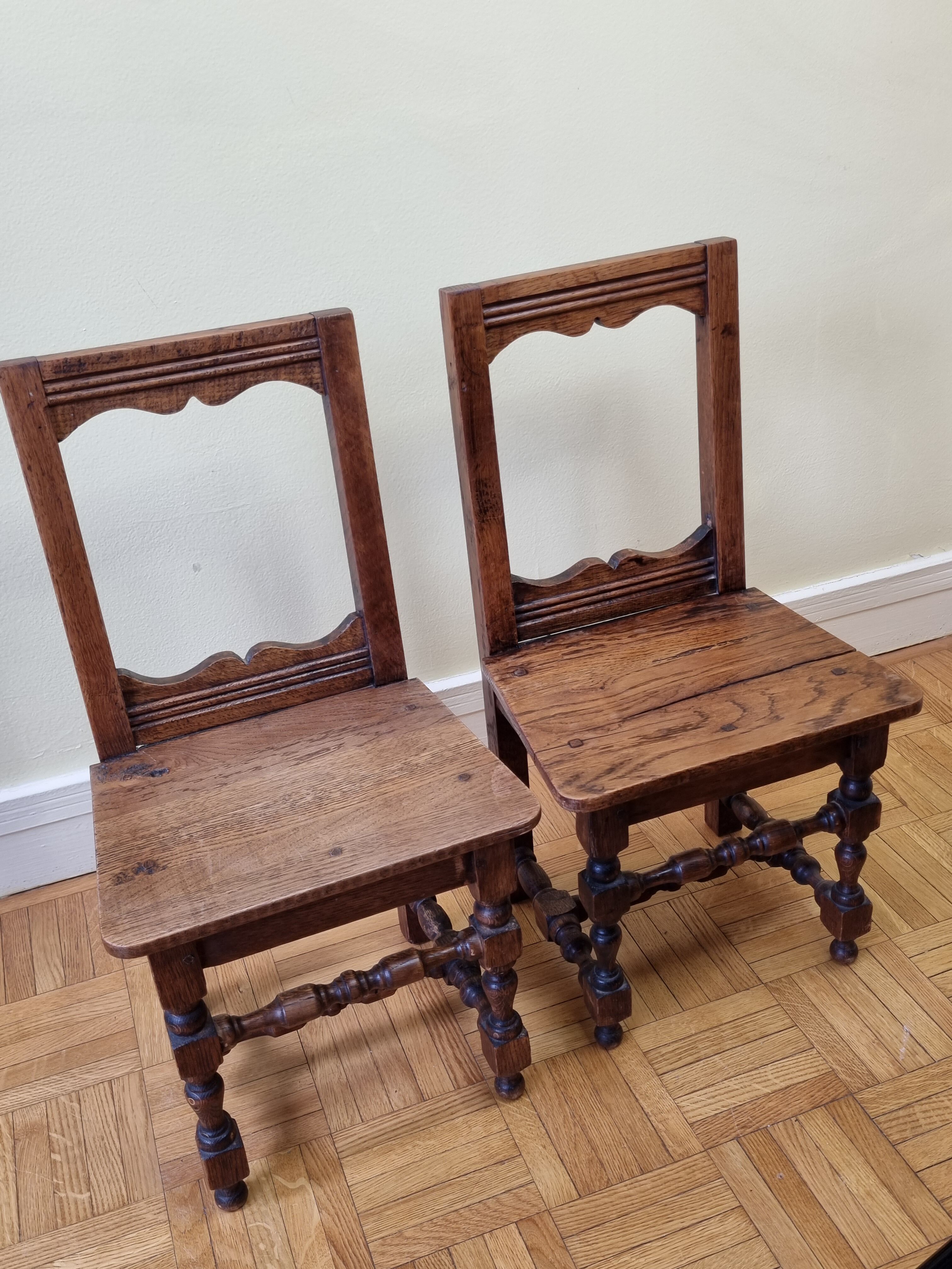 Pair of old children's chairs made of solid wood