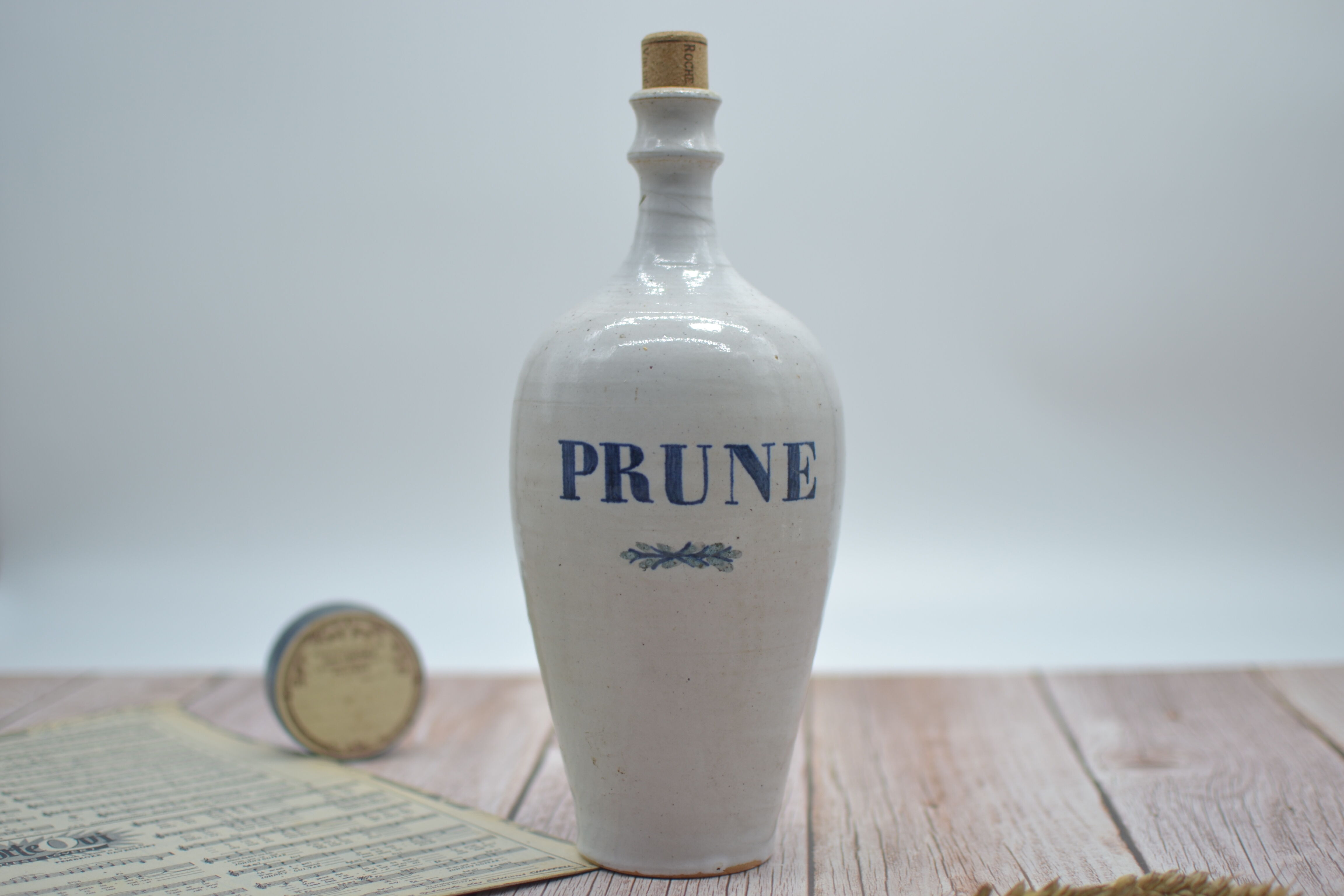 Vintage plum stoneware bottle