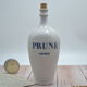 Vintage stoneware bottle in plum