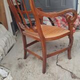 Mulched armchair of golden rye in solid walnut period Restoration around 1820