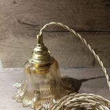 Amber tulip glass portable lamp, golden braided cord.