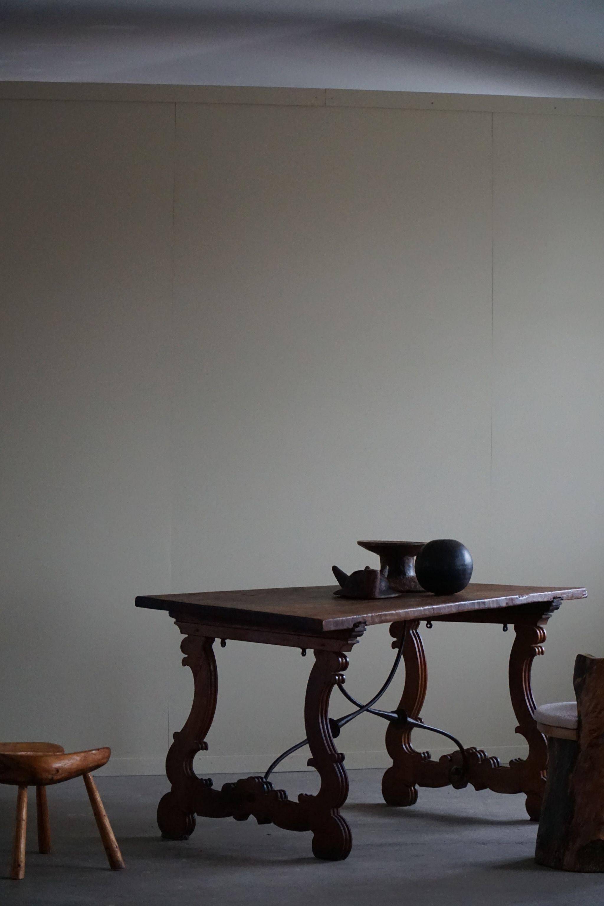 Brutalist table in antique Spanish solid oak and wrought iron, 19th century.