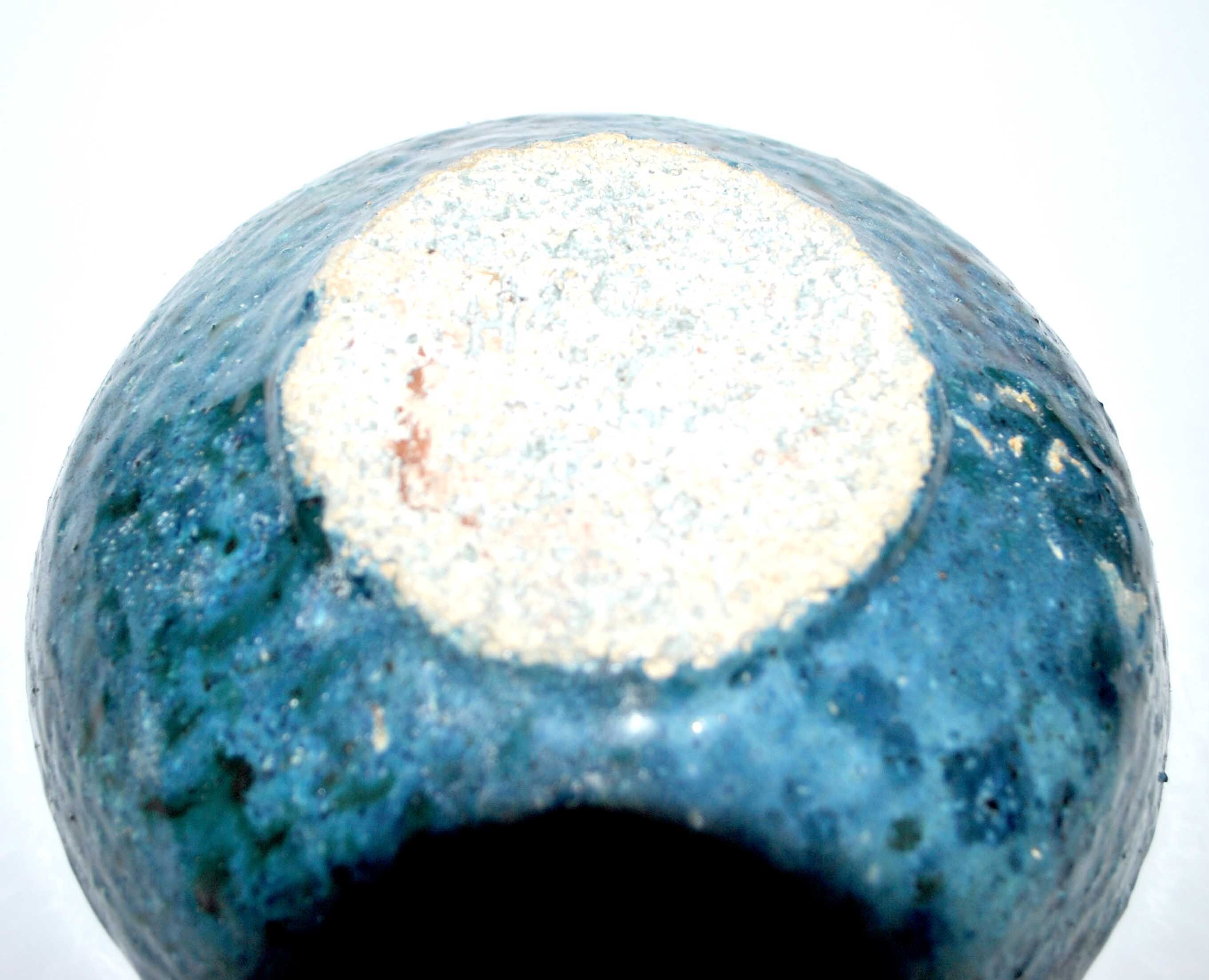 Vintage blue ceramic vacuum bag cup